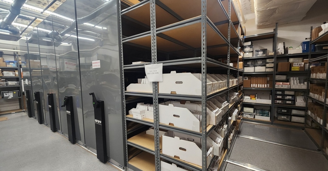 Vertical Rivet Shelving with Organization Bins