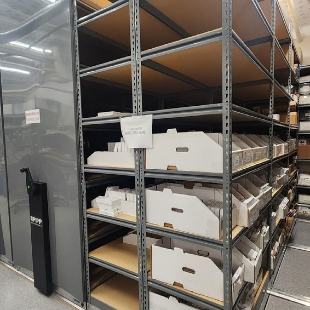 Vertical Rivet Shelving with Organization Bins