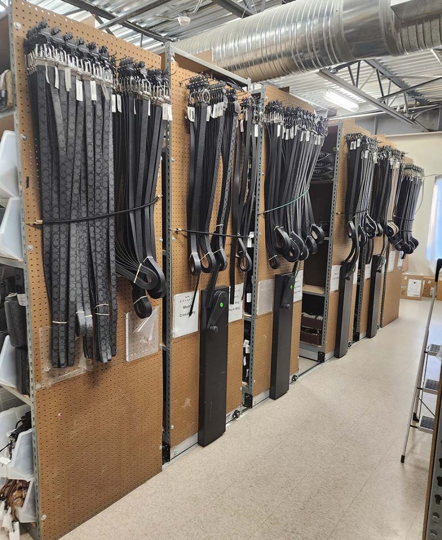 Mobile retail storage racks with belts